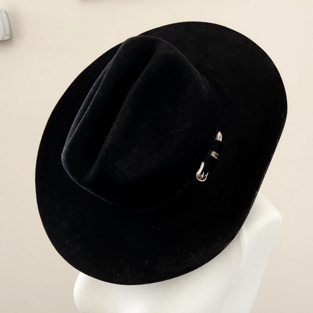 Black Cowboy Hat Blue Chair Bay